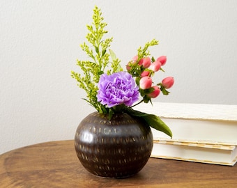 satiny brown carved ceramic orb vase