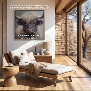 Puede incluir: Una impresi&oacute;n en lienzo de un toro blanco y marr&oacute;n con una vista de cerca de su rostro. El lienzo est&aacute; enmarcado con un marco de madera y el texto "CANVAS TEXTURE LOOKS REAL!" est&aacute; impreso debajo de la imagen.