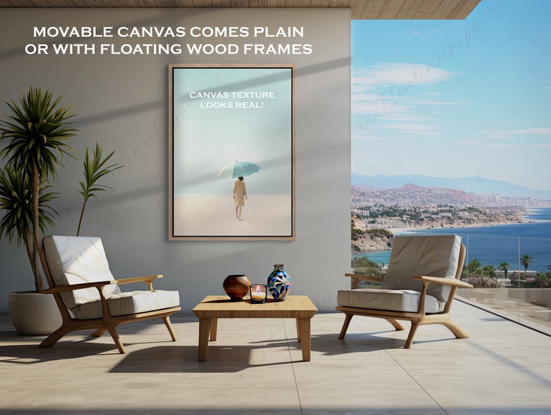 May include: A canvas print of a person walking on a beach with an umbrella. The print is framed in a wooden frame and is hanging on a wall in a living room. The text "CANVAS TEXTURE LOOKS REAL!" is printed on the canvas.