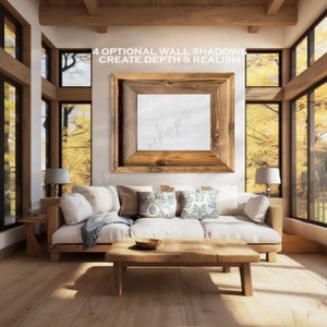 Puede incluir: Un marco de madera r&uacute;stico con fondo blanco cuelga de una pared en una sala de estar. El marco est&aacute; delante de una ventana grande con vistas a los &aacute;rboles. Un sof&aacute; blanco con almohadas se encuentra delante de una mesa de caf&eacute; de madera. El texto "4 OPTIONAL WALL SHADOWS CREATE DEPTH & REALISM" est&aacute; por encima del marco.