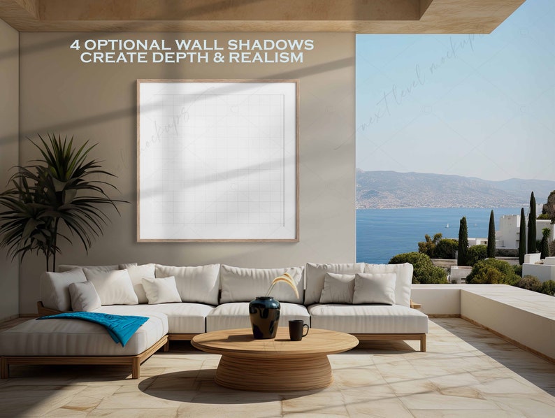 May include: A white sectional sofa with blue throw blanket sits on a light brown tiled floor in a modern living room with a large window overlooking a scenic ocean view. The text "4 OPTIONAL WALL SHADOWS CREATE DEPTH & REALISM" is displayed above a framed white canvas.