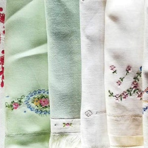 Vintage hand embroidered table linen/doilies