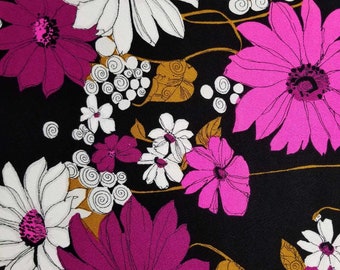 True vintage seventies fabric remnant abstract bright fuschia, pink white daisies/dahlias on crisp black background w taupe  leaves