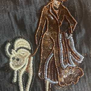 Glass beaded and sequined art deco woman walking an exotic cat Fabric patch/swatch