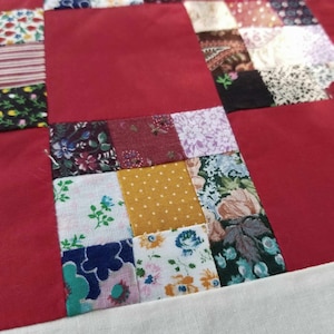 vintage hand made quilt top reds and white seed bags