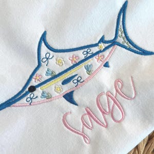 Blue Marlin Satin Stitch Outline Embroidery Design With Flowers and Bows