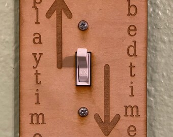Custom light switch cover/coat hook