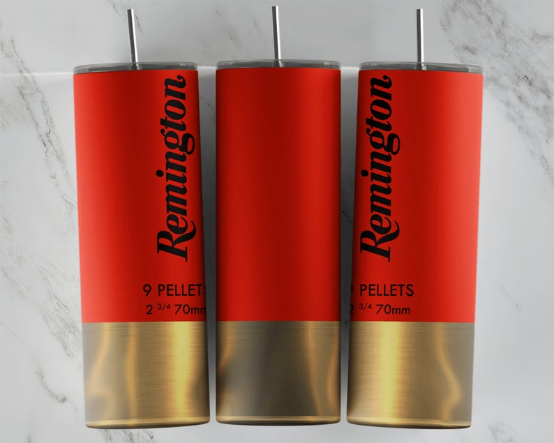 Puede incluir: Tres vasos rojos y dorados con un logotipo "Remington" negro y el texto "9 Pellets 2 3/4 70mm".