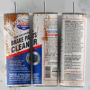 May include: A rusty metal can with a white label that reads "Lucas Oil Product Inc. Non-Chlorinated Brake Parts Cleaner". The can has a red and blue design with a warning label on the back.