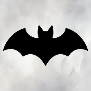 May include: A black silhouette of a bat with outstretched wings against a soft, blurred background. The bat's wings are wide and curved, with pointed tips. The bat's head has two small, pointed ears. The overall design is simple and graphic.