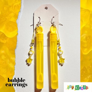 des bulles portables ! boucles d&#39;oreilles jaunes