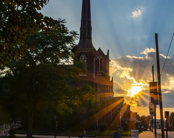Evening Sunburst in Front of Bethel AME Church and St. Andrews The Apostle Parish
