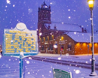 First United Methodist Church Framed Between Monongahela Sign and Street Lamp On Snowy January Night