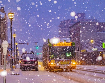 Mid Mon Valley Transit Bus Traveling up East Main Street on Snowy January Night