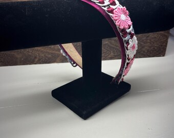Headband made out of soda tops