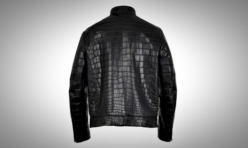 May include: A black leather jacket with a crocodile skin pattern.