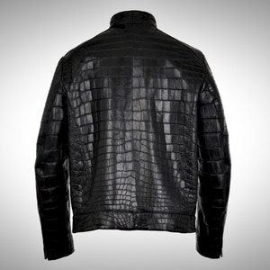 May include: A black leather jacket made from crocodile skin.