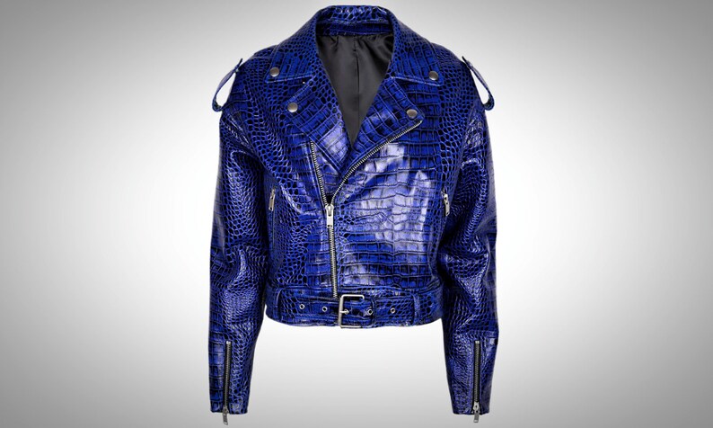 May include: A blue faux crocodile leather motorcycle jacket with a zipper closure and a belt at the waist.