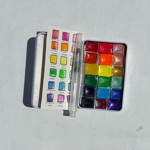 HANDMADE WATERCOLOR SET Pocket Palette for Travel or Plein Air Painting 18 half pans of paint with earth tones, flourescent and shimmer.