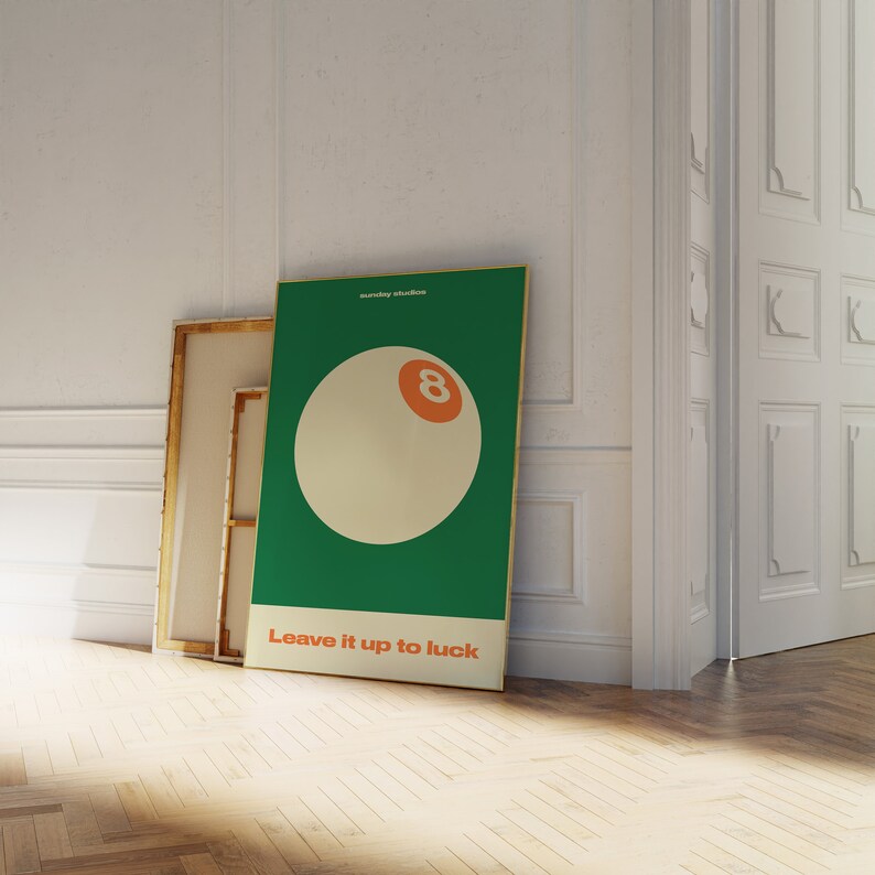 May include: A green poster with a white 8-ball and the text "Leave it up to luck".