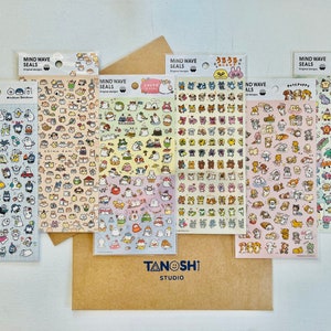 May include: A set of ten sheets of stickers featuring various cute animal designs. Each sheet has a different color scheme and features a different animal theme. The stickers are labeled "Mind Wave Seals" and "Original Designs".