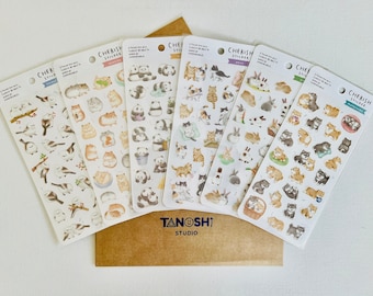 May include: Set of six sheets of stickers featuring various adorable animals. Each sheet has a different theme: birds, cats, pandas, bunnies, and dogs. The stickers are printed on white paper with a light brown background. The text on the stickers reads "Cherish Sticker" and "Tanoshi Studio".