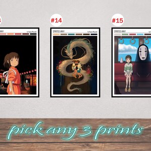 May include: Three framed art prints featuring scenes from the animated film "Spirited Away." Each print has a black frame and depicts different characters and settings. The text "pick any 3 prints" is written in a teal script font.