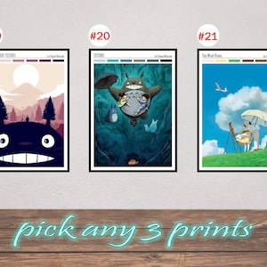 May include: Three framed art prints featuring characters and scenes from Studio Ghibli films. The prints include images from "My Neighbor Totoro" and "The Wind Rises". The text "pick any 3 prints" is written in a light blue script at the bottom.