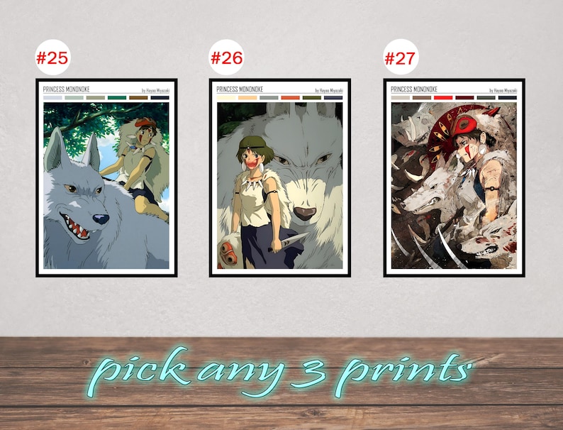 May include: Three framed art prints featuring scenes from "Princess Mononoke." Each print showcases characters and creatures from the animated film. The prints are displayed against a neutral background, with the text "pick any 3 prints" at the bottom.