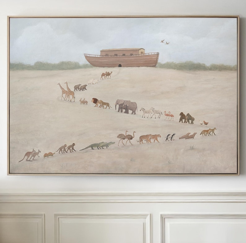 May include: A framed painting depicts a wooden ark on a hill, with pairs of animals walking towards it. The animals include giraffes, lions, elephants, zebras, and kangaroos. The artwork has a neutral color palette with a light brown frame.