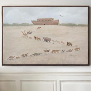 May include: A framed painting depicts a wooden ark on a hill, with pairs of animals walking towards it. The animals include giraffes, lions, elephants, zebras, and more. The artwork has a neutral color palette with a brown frame.