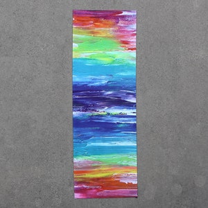 May include: Abstract painting with horizontal stripes of red, orange, yellow, green, blue, purple, and pink.
