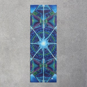May include: A blue yoga mat with a geometric pattern of triangles and swirls. The pattern is in shades of blue, green, and purple.