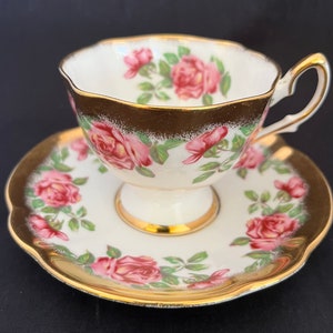 Vintage Salisbury Rose and heavy gold gilt tea cup and saucer.  Fine bone China England