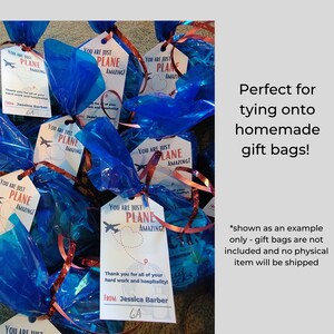 May include: Blue cellophane gift bags tied with red ribbon and decorated with white tags that say "You are just plane amazing!" The tags have a small airplane graphic and the text "Thank you for all of your hard work and hospitality! From: Jessica Barber GA".