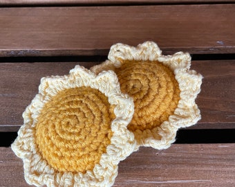 Crocheted star and sun plushies