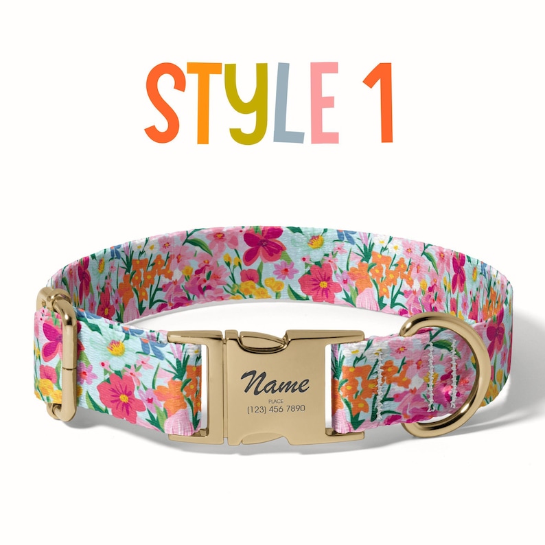 a dog collar with a name plate and flowers on it