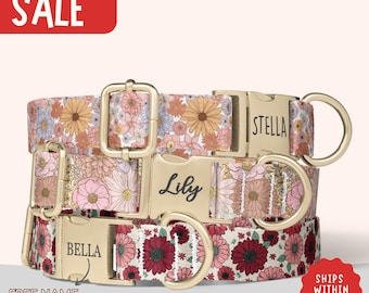 May include: Three floral dog collars with gold-colored hardware. The collars are personalized with the names "Bella", "Lily", and "Stella". The collars feature a variety of flower patterns in shades of pink, orange, and burgundy. The word "SALE" is in a red rectangle.