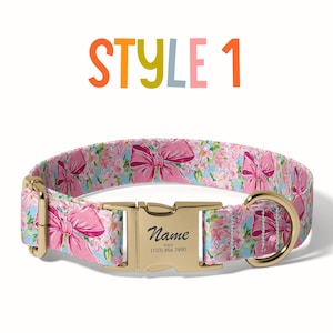 a pink floral dog collar with a name plate