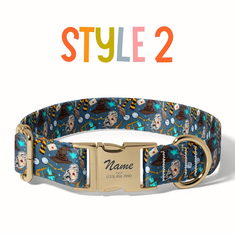 A colorful dog collar with a pattern of various cartoon-style characters and objects, including a witch's hat, broomsticks, and a castle. The collar has a gold buckle and the text "STYLE 2" is displayed above it.
