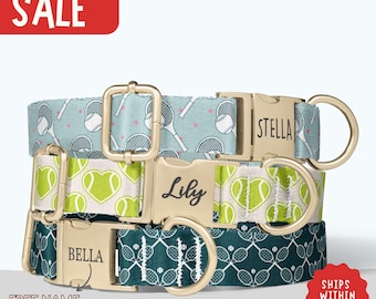 May include: Three dog collars with gold-colored buckles and personalized nameplates. The collars feature tennis-themed patterns in teal, green, and dark teal. The top collar has a tennis racket and ball design, the middle collar has tennis heart designs, and the bottom collar has a tennis racket design. The word "SALE" is in the top left corner.