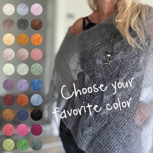 May include: A sheer, gray shawl with a delicate, open weave is draped over a person. The text "Choose your favorite color" is visible. A color palette of yarn samples in various colors is displayed.