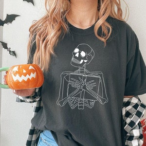 Skeleton Book Lover Shirt: Spooky Halloween Reader Tee
