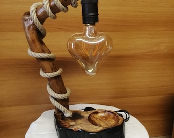 Pocket-emptying lamp in olive wood and resin (with rope)
