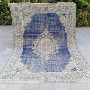 Handmade Wool Turkish Rug: 6.7x9.4 ft Vintage Anatolian Area Rug