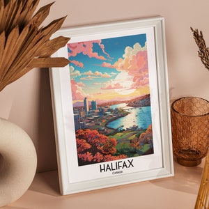 K&ouml;nnte beinhalten: Ein gerahmter Druck einer farbenfrohen Illustration der Skyline von Halifax mit einem rosa und blauen Himmel, Wasser und B&auml;umen. Der Druck tr&auml;gt den Text "HALIFAX CANADA" am unteren Rand.