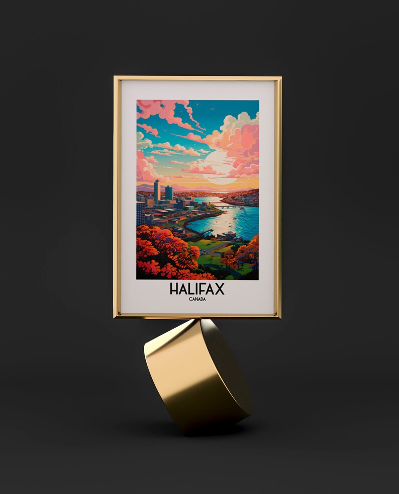 K&ouml;nnte beinhalten: Ein gerahmter Druck einer Stadtlandschaft mit einem Fluss und einem Sonnenuntergangshimmel. Der Druck ist mit "Halifax, Kanada" betitelt.