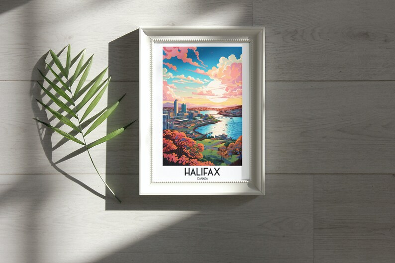 K&ouml;nnte beinhalten: Ein gerahmter Druck einer farbenfrohen Stadtlandschaft mit einem Gew&auml;sser und einem strahlend blauen Himmel. Der Druck tr&auml;gt den Text "HALIFAX CANADA" am unteren Rand.