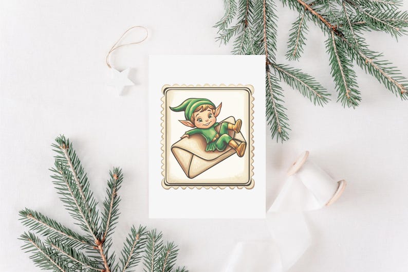 May include: A greeting card featuring a cartoon elf in a green outfit and hat, reclining on a tan envelope. The card has a decorative border and is set against a white background with pine branches and a star ornament.