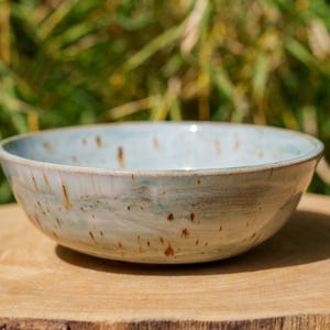 Large sky blue ceramic bowl. Beige and blue bowl in handcrafted pottery.